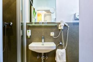 Koupelna v ubytování Hotel Heigl