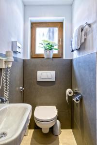 Koupelna v ubytování Hotel Heigl