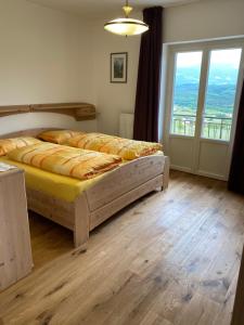 Posteľ alebo postele v izbe v ubytovaní Emily Elisa Traum Ferienwohnung mit atemberaubenden Seeblick