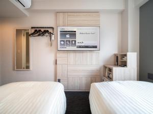 Katil atau katil-katil dalam bilik di Super Hotel Gotenba - 1