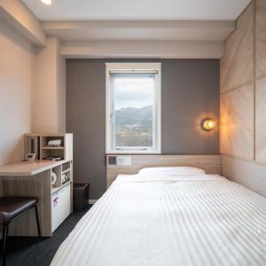 Katil atau katil-katil dalam bilik di Super Hotel Gotenba - 1