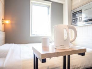 Postel nebo postele na pokoji v ubytování Super Hotel Gotenba - 1