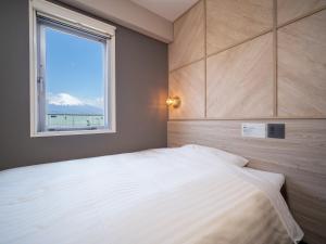 Katil atau katil-katil dalam bilik di Super Hotel Gotenba - 1