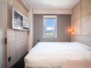 Katil atau katil-katil dalam bilik di Super Hotel Gotenba - 1