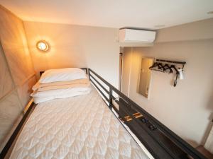 Katil atau katil-katil dalam bilik di Super Hotel Gotenba - 1
