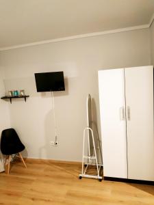 Μια τηλεόραση ή/και κέντρο ψυχαγωγίας στο Emerald Dream House,Heart of the City Center