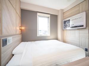 Katil atau katil-katil dalam bilik di Super Hotel Gotenba - 1