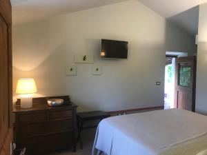 A bed or beds in a room at Casa Minotti Relais