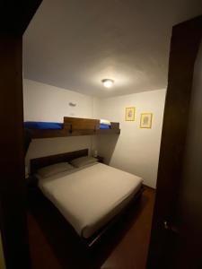 Ένα ή περισσότερα κρεβάτια σε δωμάτιο στο Apartment 89 Residence Palace 2