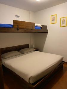 Ένα ή περισσότερα κρεβάτια σε δωμάτιο στο Apartment 89 Residence Palace 2