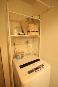 A kitchen or kitchenette at Espor Shinmachi simple accommodation / Vacation STAY 81089