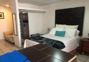 My Suite Ejecutiva客房内的一张或多张床位