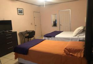 My Suite Ejecutiva客房内的一张或多张床位