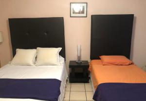 My Suite Ejecutiva客房内的一张或多张床位