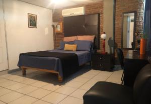 My Suite Ejecutiva客房内的一张或多张床位