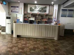 a store with a counter in a room at 7days Inn·Zibo Zhoucun Taoyuan Ginza Branch in Zibo