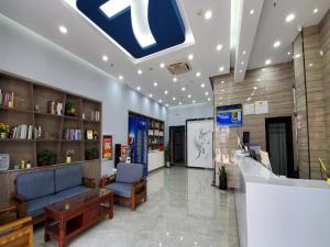 a store with a large pepsi sign on the ceiling at 7Days Inn Qingzhou Pingzhangfu Store in Weifang