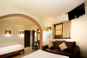 Et opholdsområde på Hotel Casa del Virrey & Suites