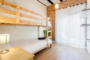 Posteľ alebo postele v izbe v ubytovaní Apartamento Ruzafa Centro II