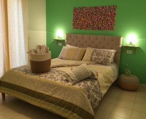 Ένα ή περισσότερα κρεβάτια σε δωμάτιο στο Intra Rooms
