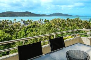 a view from the balcony of a balcony overlooking the ocean at 2 Bedroom Poinciana Lodge in Hamilton Island