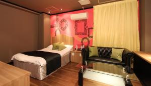 Postel nebo postele na pokoji v ubytování Restay Sun City (Adult Only)