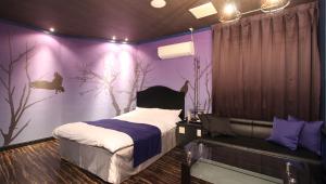 Postel nebo postele na pokoji v ubytování Restay Sun City (Adult Only)