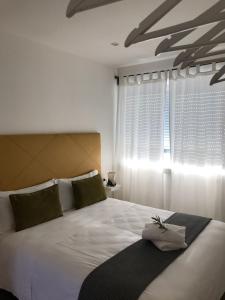 Ένα ή περισσότερα κρεβάτια σε δωμάτιο στο Casa 32