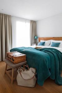 Ein Bett oder Betten in einem Zimmer der Unterkunft Luxus- Ostseeferienhäuser im Reetdorf Geltinger Birk