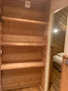 a built in closet in a tiny house at Alp'azur in L'Alpe-d'Huez