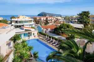 an aerial view of a resort with a swimming pool at Oscar Suites & Village in Agia Marina Nea Kydonias