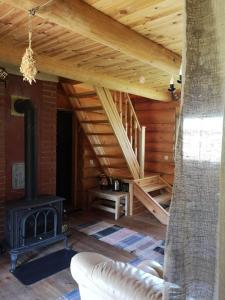 Posezení v ubytování Pirts māja Ramatas