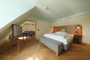Una cama o camas en una habitación de Best Western Plus Hotel Bern