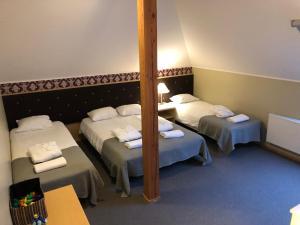 Postel nebo postele na pokoji v ubytování von ROSEN spa