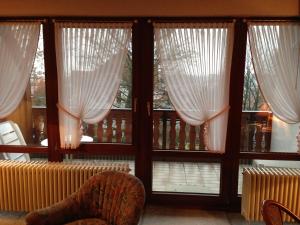 Postel nebo postele na pokoji v ubytování Hotel Sonnenhof