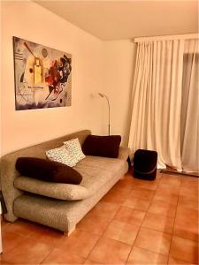 Zona de estar de Ferienwohnung mit Garten und Pool in Ascona