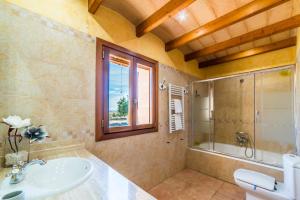 a bathroom with a sink and a shower at Ideal Property Mallorca - Puig d'en Guardiola in Moscari +59 photos