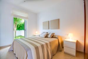 A bed or beds in a room at Ideal Property Mallorca - Casa Francina