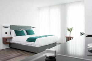 Postel nebo postele na pokoji v ubytování K BUSINESS
