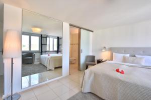Voodi või voodid majutusasutuse Hotel SiX toas