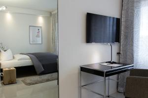 Voodi või voodid majutusasutuse Hotel SiX toas