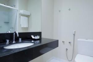 Um banheiro em Viale Cataratas Hotel & Eventos
