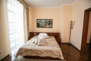 Postel nebo postele na pokoji v ubytování Карпаты