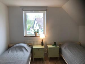 Letto o letti in una camera di Botanikerns hus