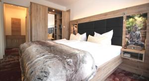 Postel nebo postele na pokoji v ubytování Wellness & Ayurveda Hotel Am Eichenberg