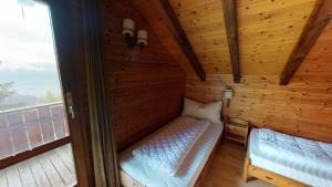 Postel nebo postele na pokoji v ubytování Tschuggen 70