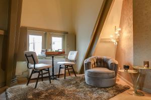 Istumisnurk majutusasutuses Brasss Hotel Suites