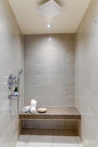 Vannituba majutusasutuses Brasss Hotel Suites