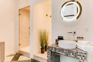 Vannituba majutusasutuses Brasss Hotel Suites
