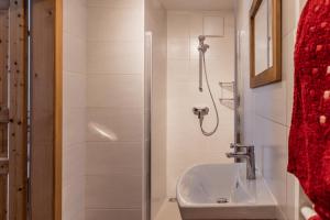a bathroom with a shower and a sink at Weingut & Buschenschank Pölzl in Großklein +52 photos